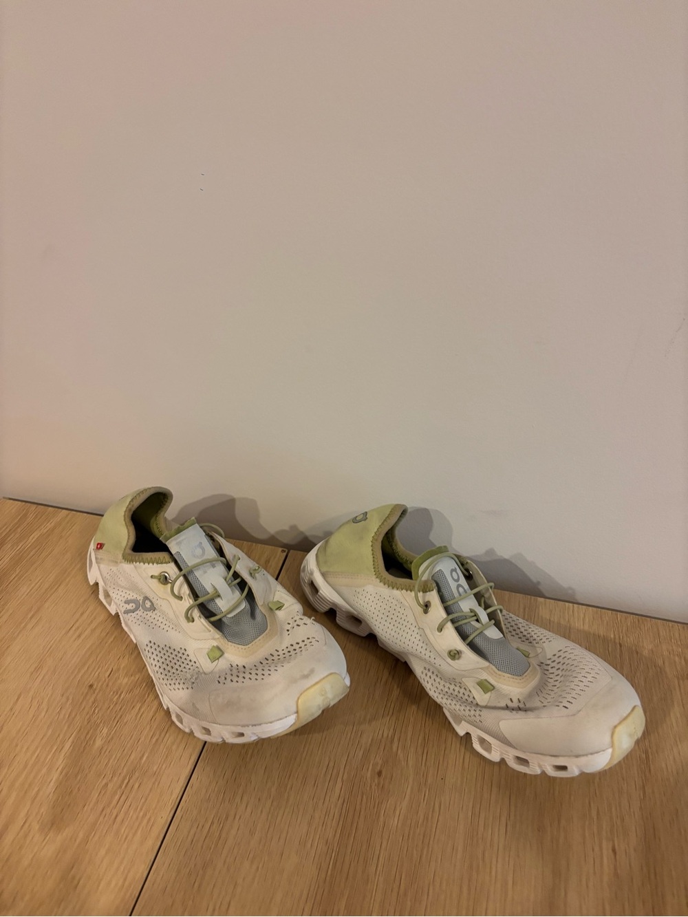 On Clouds White and Light Green Athletic Shoes
